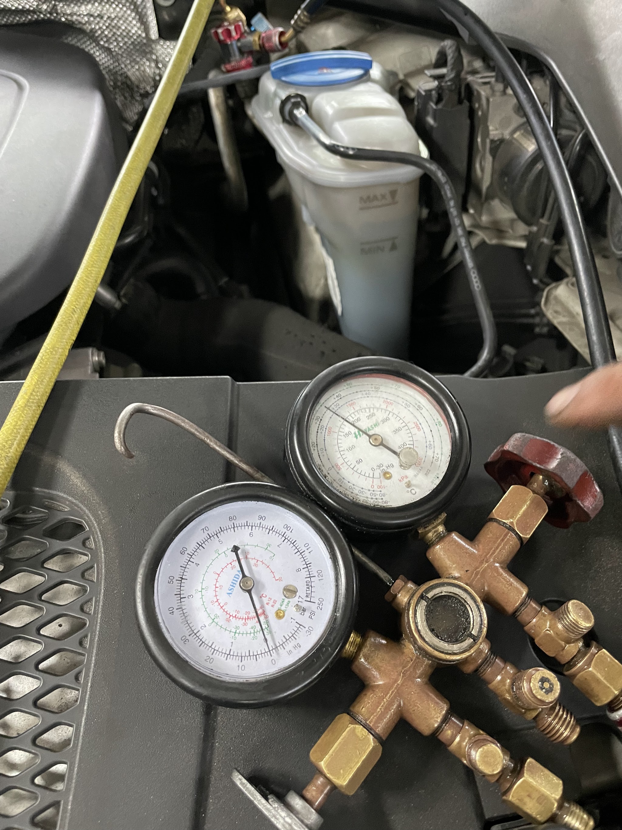Car air-conditioning work at the Ubi Road 1 workshop