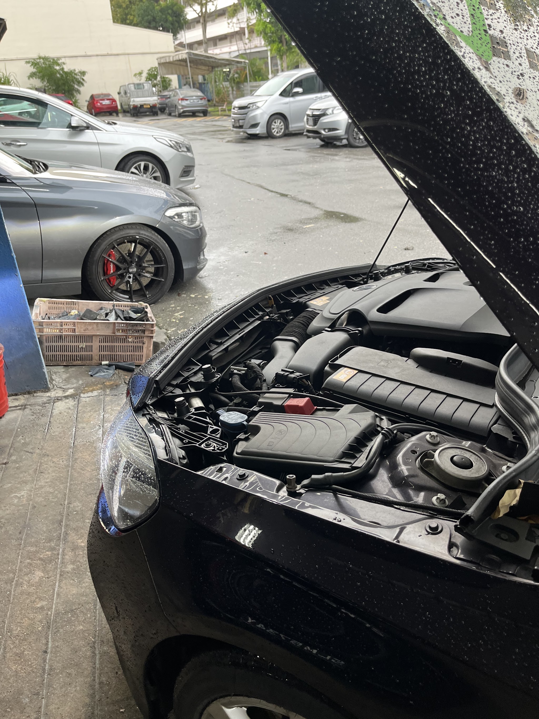 Car air-conditioning work at the Ubi Road 1 workshop